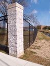 Black fence and cornerstone