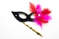 Black festive carnival mask with purple, pink, feathers Royalty Free Stock Photo