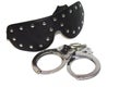 Black fetish mask and handcuff Royalty Free Stock Photo