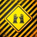 Black Firefighter gloves icon isolated on yellow background. Protect gloves icon. Warning sign. Vector