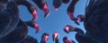 Black flamingos group looking down in circle against blue sky Royalty Free Stock Photo