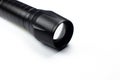 Black Flashlight on the white background. Close up Royalty Free Stock Photo