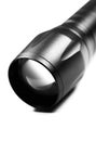 Black Flashlight on the white background. Close up Royalty Free Stock Photo