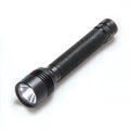 Black flashlight with a white light beam Royalty Free Stock Photo