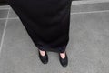 Black Flat Shoes, Close Up Female Wear Black Shoes on the Concrete Background