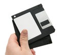 Black floppy discs in hand Royalty Free Stock Photo