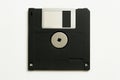 Black floppy disk isolated on white background representing vintage technology and retro computing concept of data storage Royalty Free Stock Photo