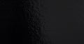 Black foil gradient texture background with uneven surface
