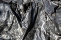 Black foil plastic surface texture Royalty Free Stock Photo