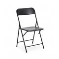 A black folding chair, isolated on a white Royalty Free Stock Photo