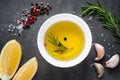 Black food background with olive oil and spices Royalty Free Stock Photo