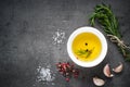 Black food background with olive oil and spices Royalty Free Stock Photo