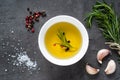 Black food background with olive oil and spices Royalty Free Stock Photo