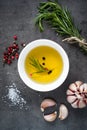 Black food background with olive oil and spices Royalty Free Stock Photo