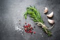 Black food background with olive oil and spices Royalty Free Stock Photo