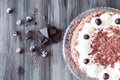 Black forest cake decorated with whipped cream and cherries. Royalty Free Stock Photo