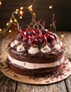 Black forest cake layered with whipped cream, cherry liqueur. German dessert. Sweet food