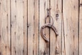 Yellow forging forged horseshoe wood wooden brown door texture background black old vintage