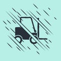 Black Forklift truck icon isolated on green background. Fork loader and cardboard box. Cargo delivery, shipping Royalty Free Stock Photo