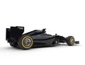Black formula one car with soft compound tires equipped