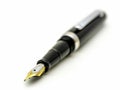 A black fountain pen with gold trim Royalty Free Stock Photo