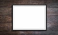 Black frame on wooden background -blank picture design mockup Royalty Free Stock Photo