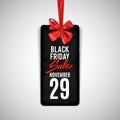 Black friday advertisement, sale tag with decorative bow, vector illustration Royalty Free Stock Photo