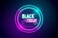 Black Friday banner blue and pink neon light circle frame with brick wall background. vector illustration Royalty Free Stock Photo