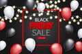 Black Friday banner design template. Big sale advertising promo concept with balloons, glowing garland, shop now button, and typog Royalty Free Stock Photo