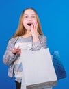 Black friday best deals. Happy child in shop with bags. Shopping is best therapy. Shopping day happiness. Buy clothes Royalty Free Stock Photo