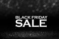Black friday bokeh background. Elegant dark blur layout design. Silver and black glitter place on table with spotlight. Luxury