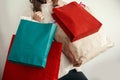 Black Friday. Christmas Sales. Happy Girl holding colorful shopping bags on white background. Space for text. Cyber Monday. Chris Royalty Free Stock Photo