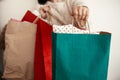 Black Friday. Christmas Sales. Happy Girl holding colorful shopping bags on white background. Space for text. Cyber Monday. Chris Royalty Free Stock Photo