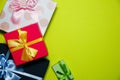 Black Friday concept photo with. Green background. Present boxes for Birthday parties. Sale and discount. Christmas shopping ideas Royalty Free Stock Photo