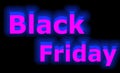 Black Friday sale neon sign in blue on black background Royalty Free Stock Photo