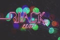 Black friday sale illustration design with neon light text style