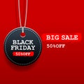 Black friday sale round tag with discount on red background
