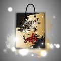 Black friday sale shopping bag with gold brushes and light effect on background. Vector illustration.