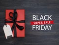 Black Friday sale shopping banner. Mockup of special day, empty black board for logo and text. Isolated black wood texture