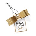 Black friday sale tag with gold bow isolated on white background Royalty Free Stock Photo