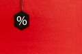 Black friday. Sale tag on the red background Royalty Free Stock Photo