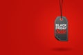 Black friday sale tag on red background