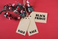 Black Friday sale tags with Christmas decorations