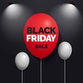 Black friday sale text on red balloon with spotlight lamp and dark background social media banner vector design