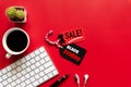 Black Friday Sale text on a red and black tag with coffee cup Royalty Free Stock Photo