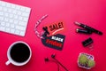 Black Friday Sale text on a red and black tag with coffee cup, plant table, gift box Earphone and mouse keyboard on red background Royalty Free Stock Photo