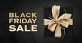 Black Friday sale text write with gift package wrapped with golden ribbon bow isolated on black background, template for