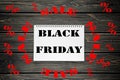 Black Friday sales Advertising Poster on Black Wooden background