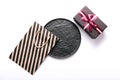 Black friday. Shopping bag, gift box and black circle plate on white background Royalty Free Stock Photo