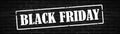 Black Friday shopping discount background banner panorama template - white grunge stamp on black dark brick wall texture